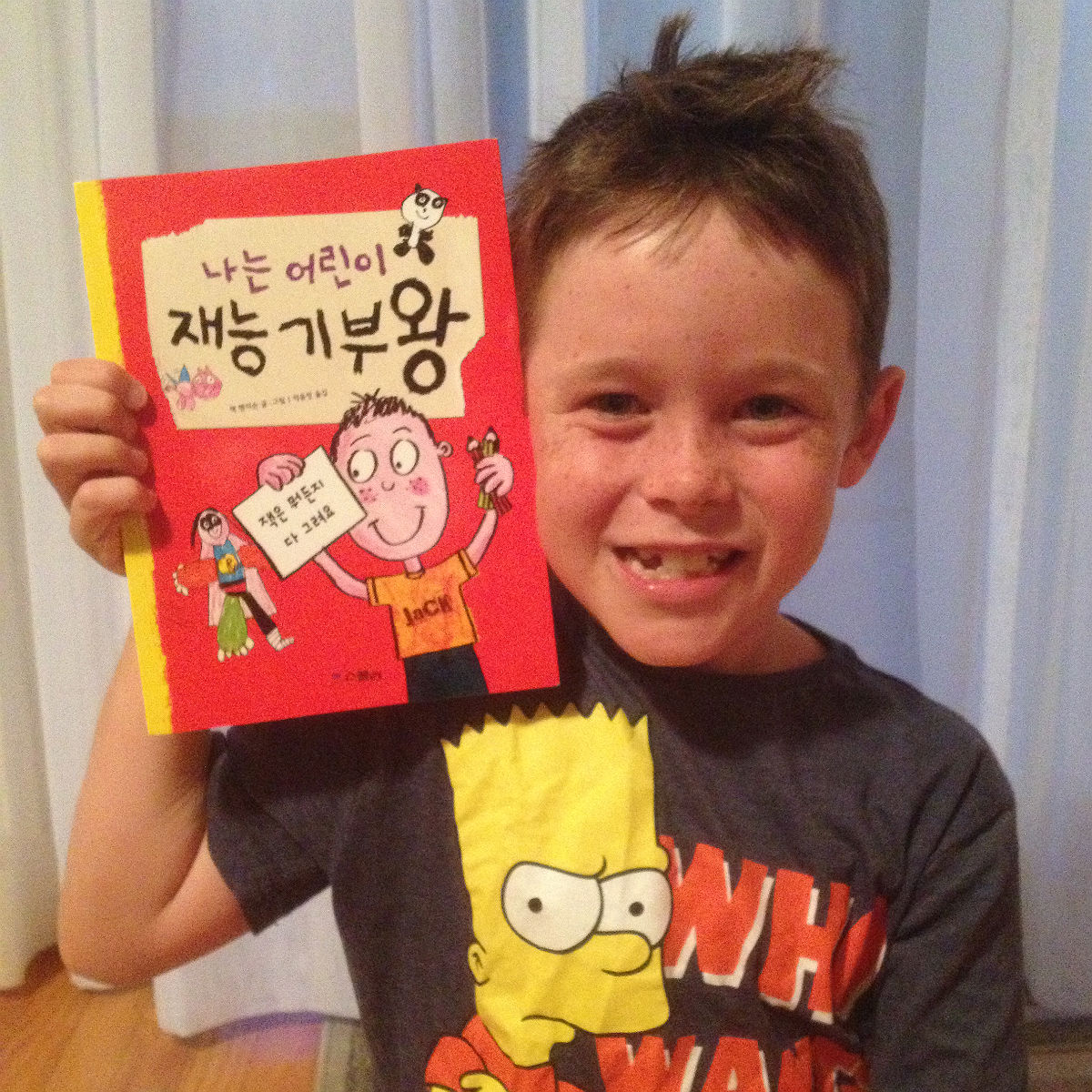 Jack with his copy of the Korean version of Jack Draws Anything