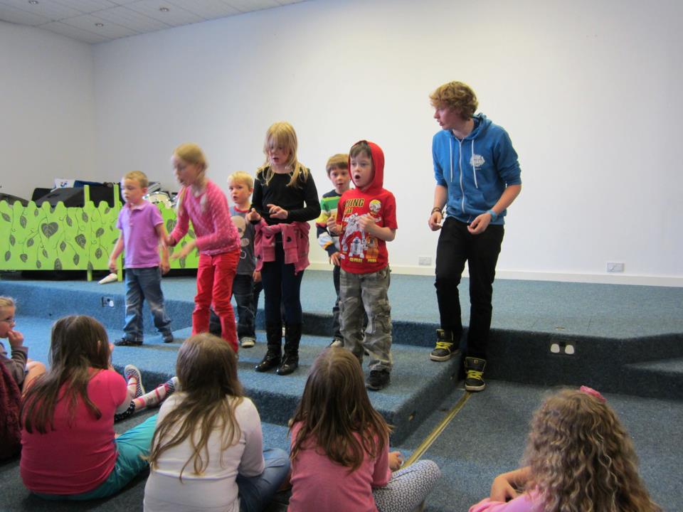 Jack on stage performing a wee play at Love Drama Camp