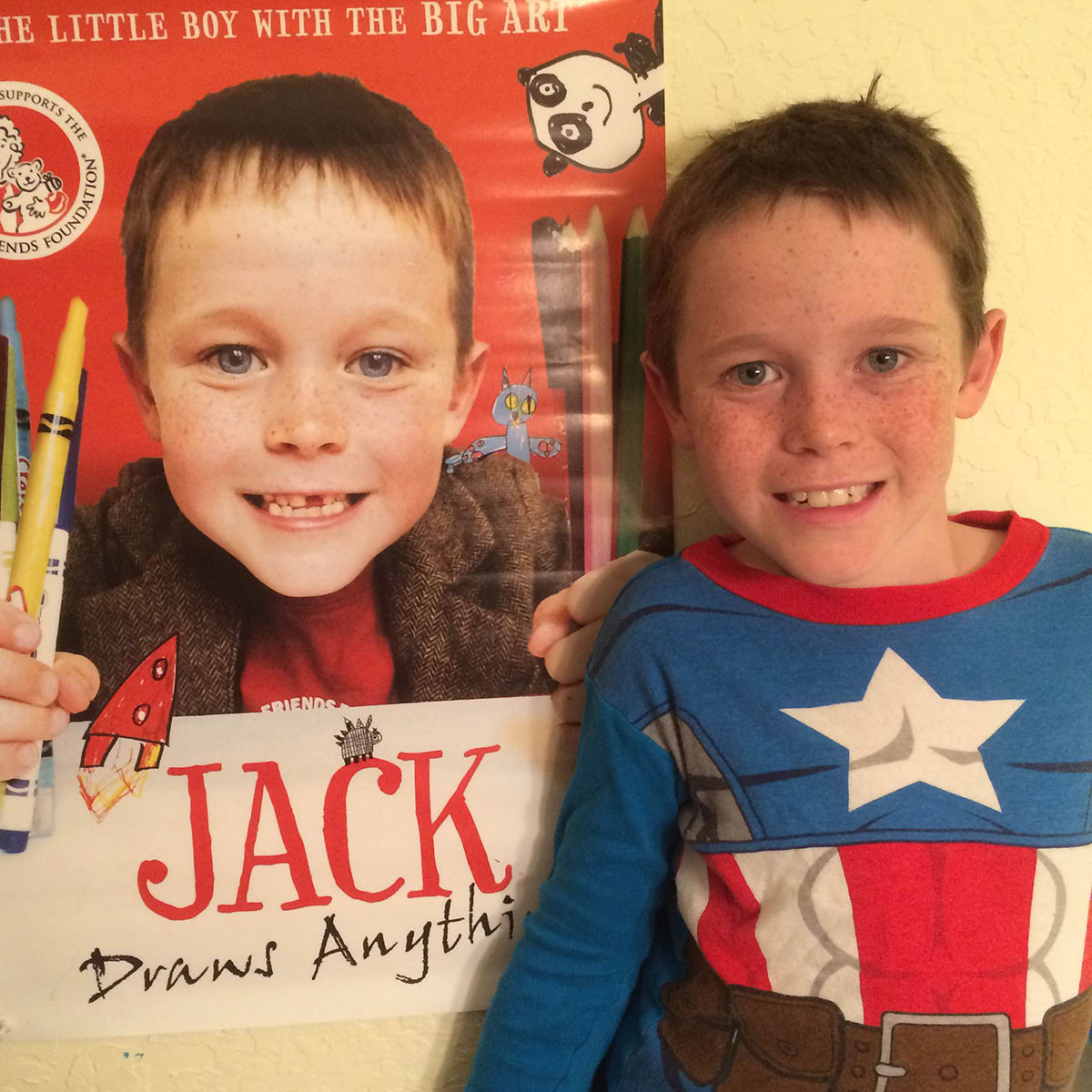 9 year–old Captain America Jack at home in California with his Jack Draws Anything poster (featuring a 6 year–old Jack)! (Photo by ED HENDERSON)